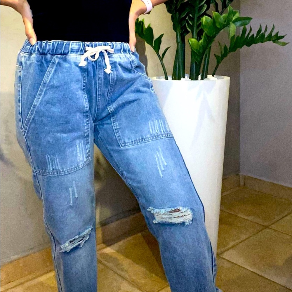 Brand new jeans from closed boutique. Light wash with ripped jeans look.